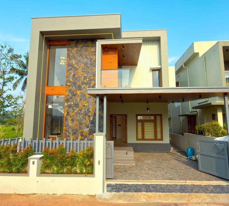 “Modern & Stunning | A House Built with Design Excellence | Pukkattupady”